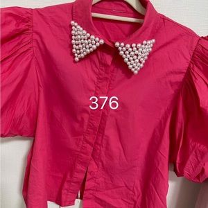 Pink top with pearl